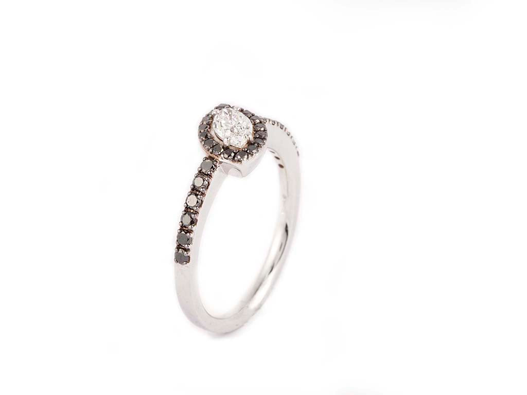 Eye Drop Shaped Ring With Dark Diamonds